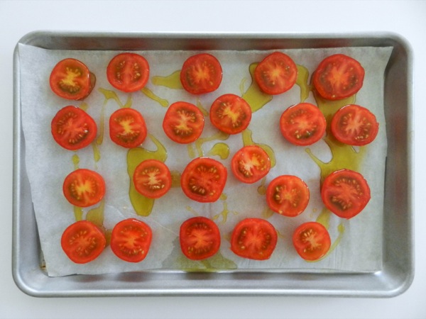 Rinse the tomatoes. Then pat dry.